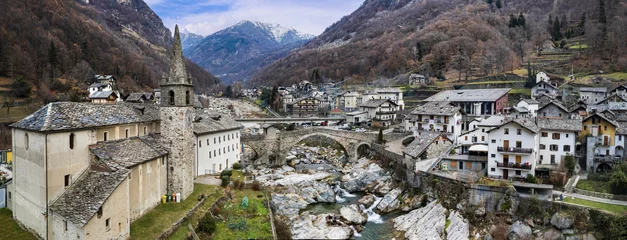 Poster most beautiful Alpine villages of northern Italy- Lillianes, medieval borgo in Valle d'Aosta region, aerial drone view. © Freesurf