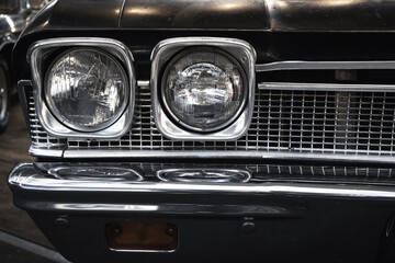 Obraz na płótnie Canvas car headlight and grill. transportation