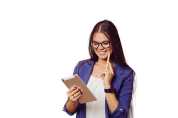 Adorable brunette in glasses with long hair dressed in dark blue suit cute smiling, holding tablet, looks happy, makes video call, over transparent background with copy space. People sincere emotions