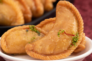 Gujia Also Called Gujiya, Pirukiya, Pirukia, Pedakiya, Karanji, Basundi Or Gughra Stuffed With Mawa, Khoya, Chasni, Mava, Khoa - Indian Sweet Dumpling Enjoyed On Deepawali, Teez, Holi, Diwali And Teej