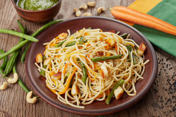 pasta with asparagus, carrots and tofu cheese