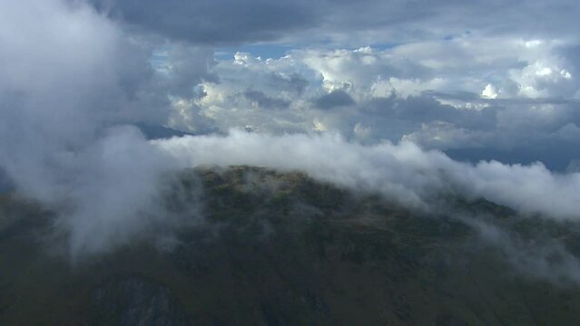 cloudy mistic flight over french alps in vanoise natural park