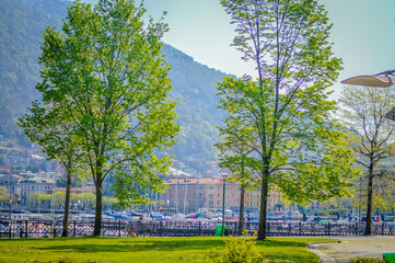 Spring in Italy, Lombardy, Milano, Como lake and city. Landscape view on hills, park, old town and water, with some interesting details, close up and panoramic.