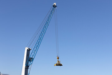 Naklejka premium An original crane in the port of Genoa, Italy