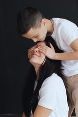Obraz premium Mom and son photo shoot in the studio.