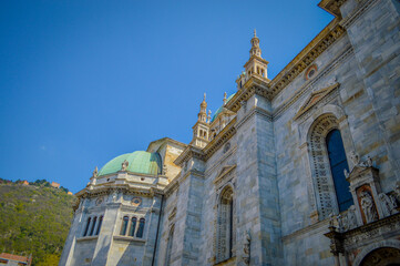 Spring in Italy, Lombardy, Milano, Como lake and city. Landscape view on hills, park, old town and water, with some interesting details, close up and panoramic.