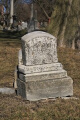 Fototapeta premium old gravestone with a blank epitaph