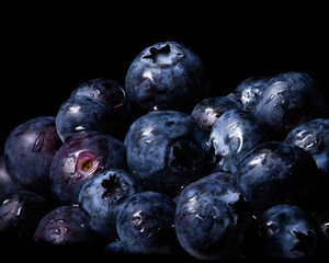 Blueberries on black background