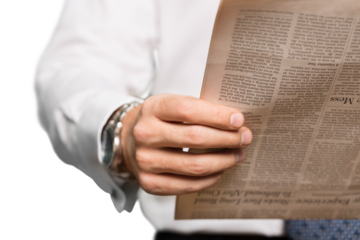 Closeup of a Businessman Reading Newspaper