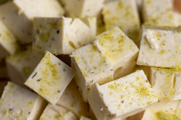 sliced white cottage cheese with spices
