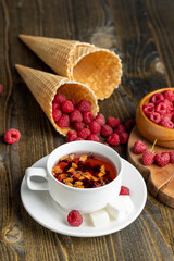 A mug of red tea on the table