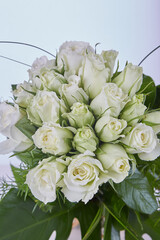 A bouquet of flowers With Green and Yellow and Red...