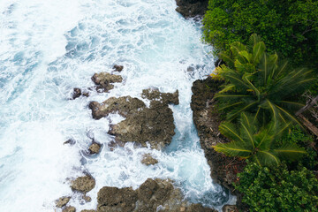 Aerial view of Seascape with waves breaking on the rocks