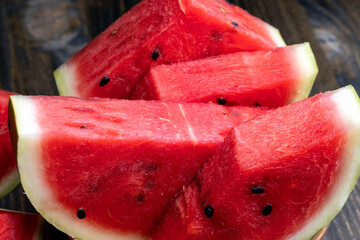 Sliced red and ripe watermelon on the table