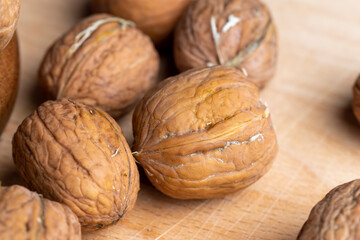 Unpeeled walnut harvest on the table
