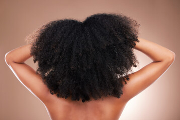 Hair, black woman with afro and beauty, haircare and natural cosmetics, back on studio background....