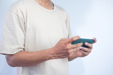 Close up of a man using mobile smart phone