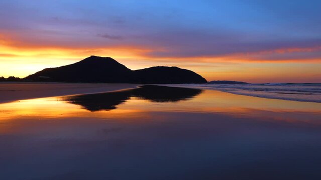 Landscape at sunset on the beach of Berria near the town of Santo&ntilde;a. Natural Park of the Marshes of Santo&ntilde;a, Victoria, Noja and Joyel. Cantabrian Sea. Cantabria. Spain. Europe