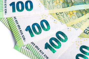 Detail of the number 100 on the one hundred euro banknote. European currency close-up photograph.