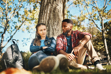 Hiking, couple and argument in a forest about location, direction or cheating confession on nature...