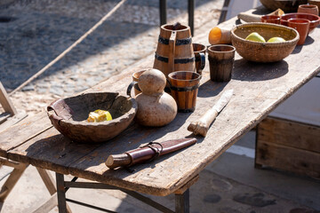 Medieval festival show, historical performance. Weapons, armor, utensils and objects of medieval life.