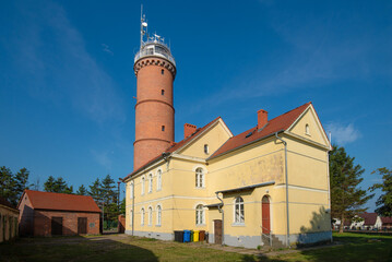Baltic Sea lighthouse in Jaroslawiec, small coastal village in Poland - 574290781