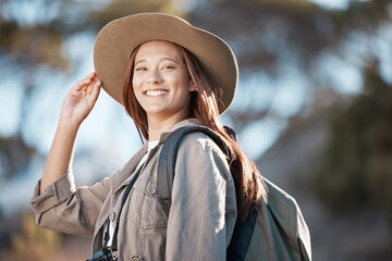 Hiking woman, portrait and smile for travel, summer and explore forest with backpack, excited and...