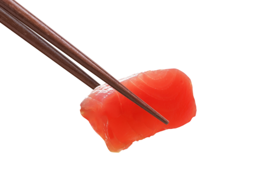 Chopsticks holding raw sliced fish. Japanese tuna sashimi. PNG transparency	