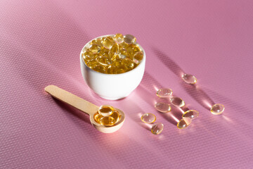 Spoons with vitamins, Vitamin D, omega 3, omega 6, Food supplement oil filled fish oil, vitamin A, vitamin E, flaxseed oil