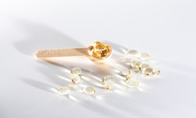 Spoons with vitamins, Vitamin D, omega 3, omega 6, Food supplement oil filled fish oil, vitamin A, vitamin E, flaxseed oil