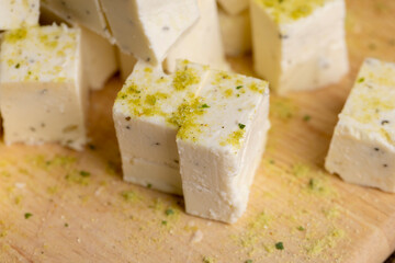 sliced white cottage cheese with spices
