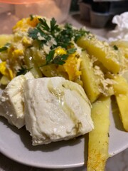 Home made potatoes white cheese parsley egg and pickles Romanian traditional food 