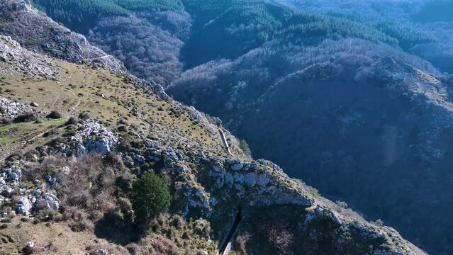Aerial view from a drone of the landscape around the Juncal channel under Arma&ntilde;&oacute;n and Los Jorrios near the Juncal reservoir and the Las Nieves hermitage. Angostina. Cantabria. Spain. Europe