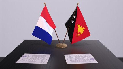 Papua New Guinea and France national flags on table in diplomatic conference room. Politics deal agreement 3D illustration