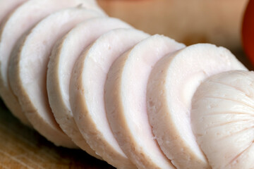 Sliced round-shaped ham from chicken meat