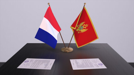 Montenegro and France national flags on table in diplomatic conference room. Politics deal agreement 3D illustration