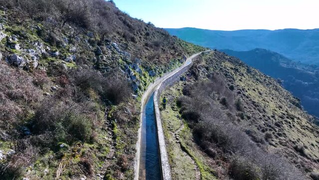 Aerial view from a drone of the landscape around the Juncal channel under Arma&ntilde;&oacute;n and Los Jorrios near the Juncal reservoir and the Las Nieves hermitage. Angostina. Cantabria. Spain. Europe