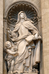 Fototapeta na wymiar Statue in St Peter's basilica, Rome. St. Teresa of Jesus. Italy. 31.07.2018