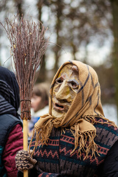 Traditional masks and costumes in Lithuania during Uzgavenes, a Lithuanian folk festival during Carnival, seventh week before Easter, vertical 