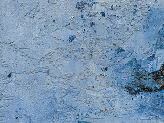 the blue wall is painted with blue vintage paint as a background
