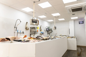 Angular photo of a workplace that is a fishmonger. Sale of food, concept of small and medium enterprises.