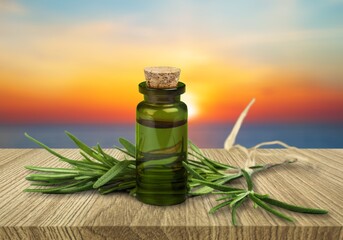 flower therapy concept, bottle and fresh aroma herbs