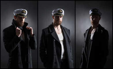 Portrait of a handsome sailor over black background. Shipping, navigation, marine, navy concept.
