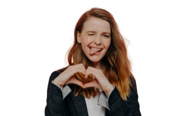 Happy excited young woman showing heart shape sign