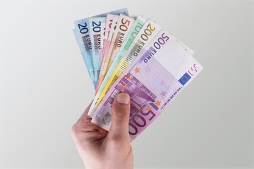 Human Hand holding money notes