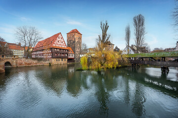 Wasserturm (Water Tower), Weinstadel (former Wine Depot), Henkerbrucke and Henkersteg bridge at Pegnitz River - Nuremberg, Bavaria, Germany