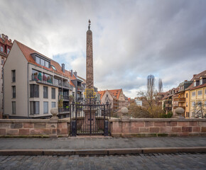 Fototapeta na wymiar Obelisk at Karlsbrucke Bridge - Nuremberg, Bavaria, Germany
