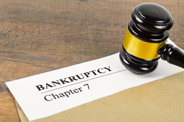 The Bankruptcy document with wooden gavel, Business concept.