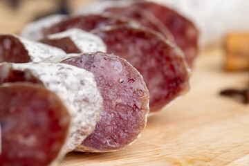 Chunks of sliced sausage with white mold