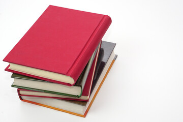 Stack of books on white background. Knowledge and education concept.